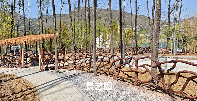 动物园里给羊驼用水泥仿树藤栏杆围起来的家第3张